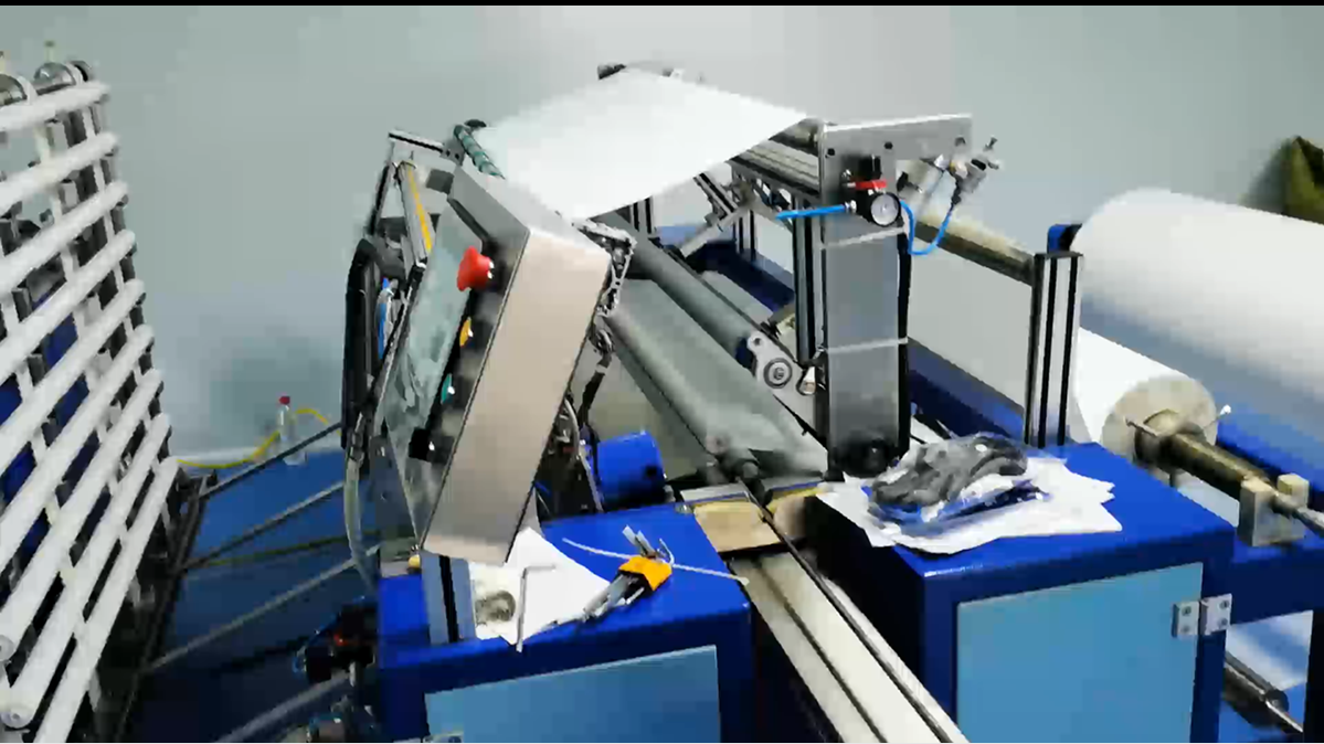 Automatic bandage wrapping paper and slitting production line