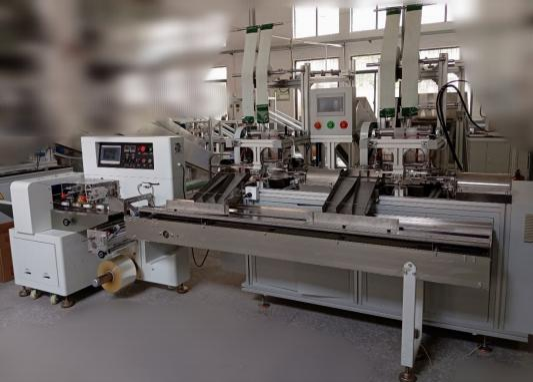 Elastic bandage rolling and packing production line